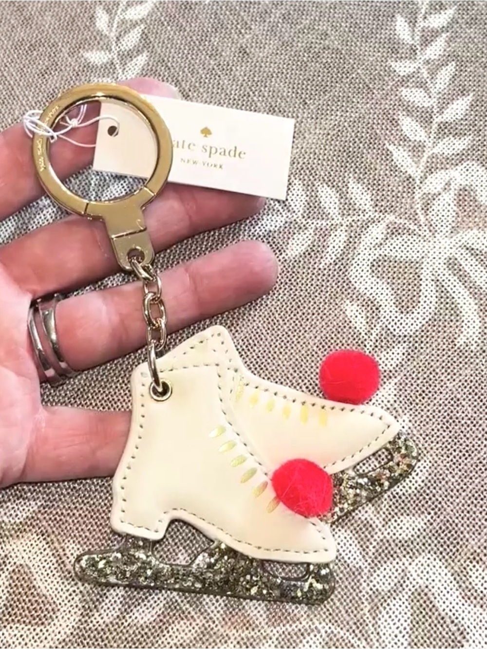 kate spade NWT! Ice skate key fob with red pom-poms